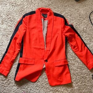 Vibrant orange blazer with Black Stripes